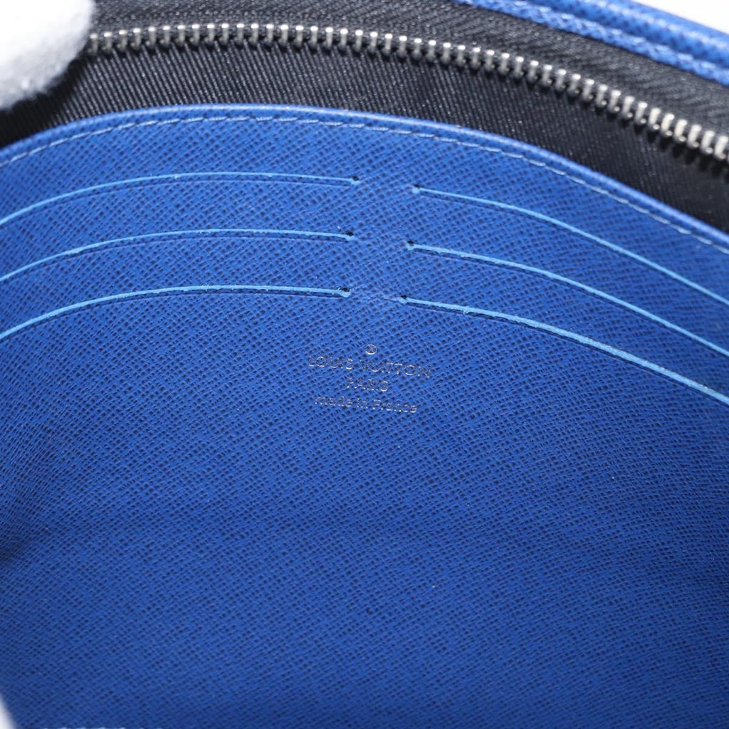 Louis Vuitton Pochette Voyage Taiga Leather Blue Leather Clutche & Pouche Bag (Pre-Owned)