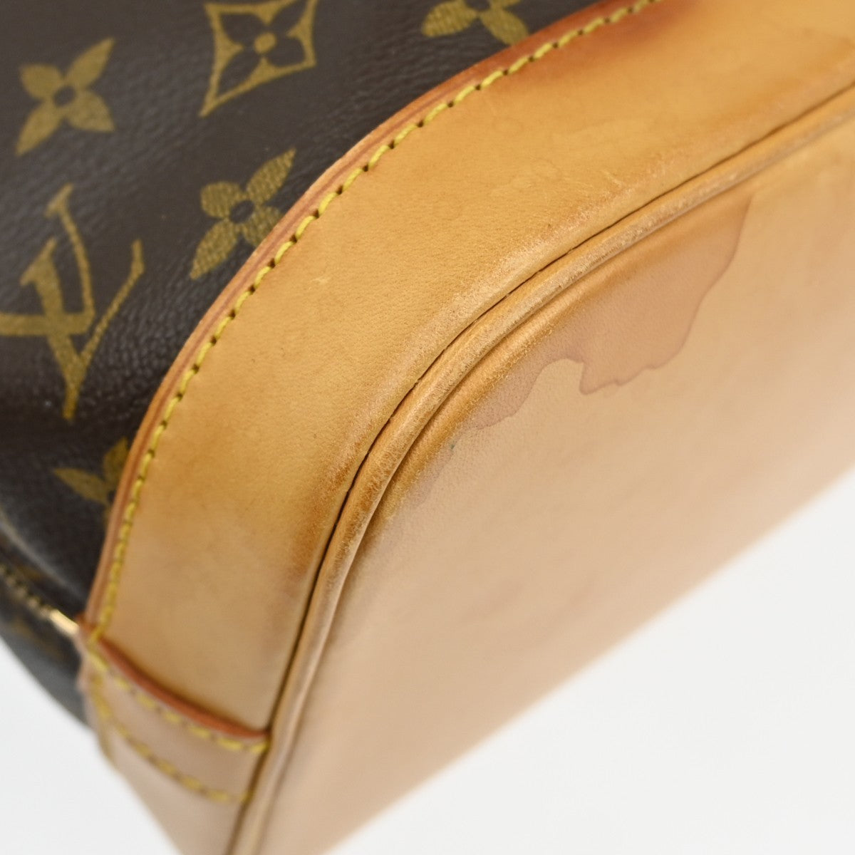 Louis Vuitton Alma Handbag Monogram Canvas Brown Canvas Handbag (Pre-Owned)