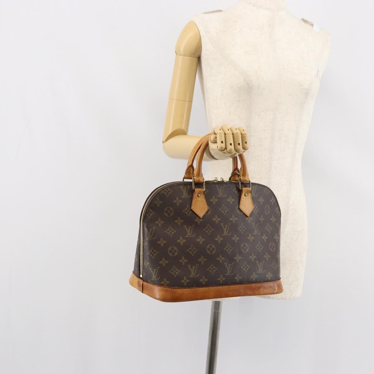 Louis Vuitton Alma Handbag Monogram Canvas Brown Canvas Handbag (Pre-Owned)