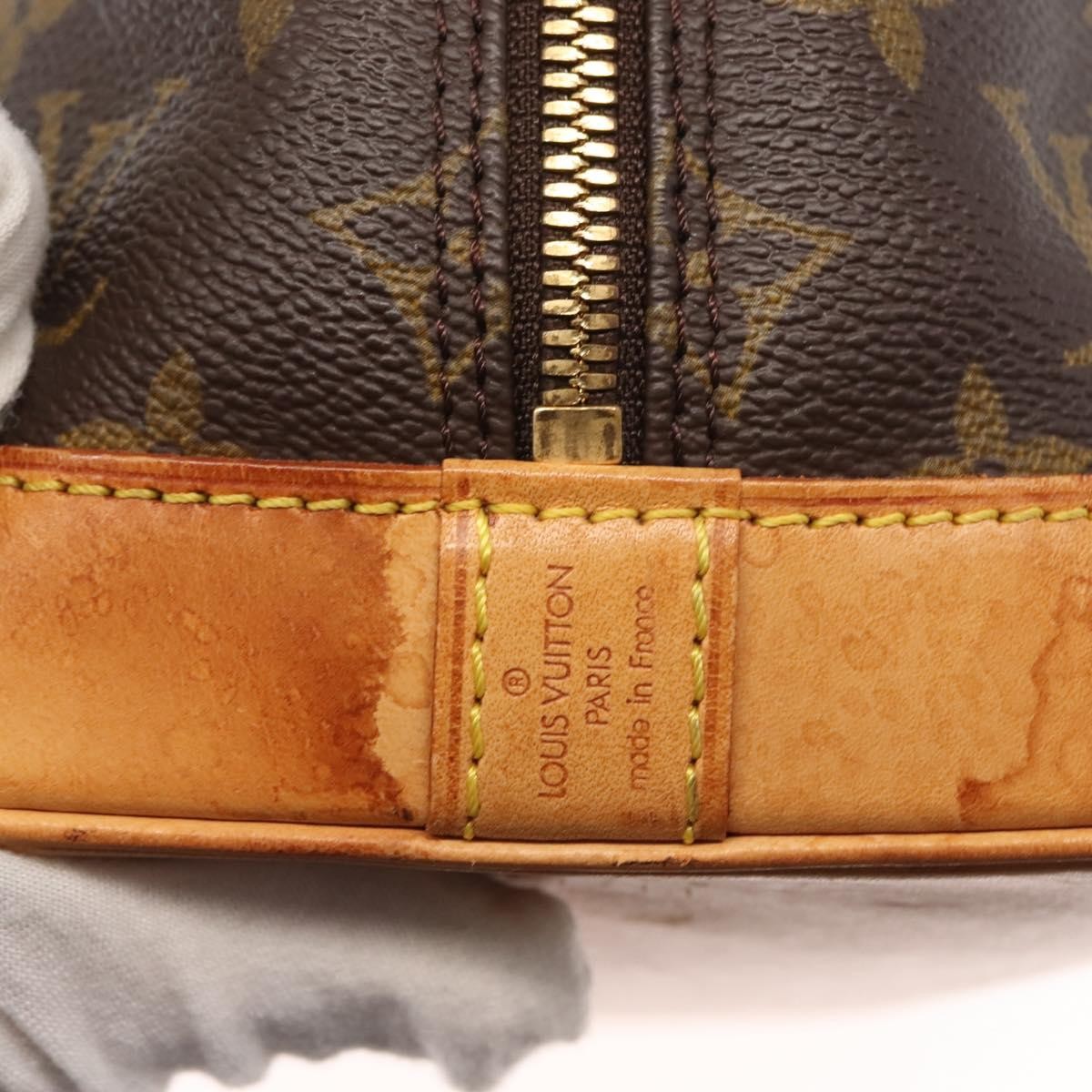 Louis Vuitton Alma Handbag Monogram Canvas Brown Canvas Handbag (Pre-Owned)