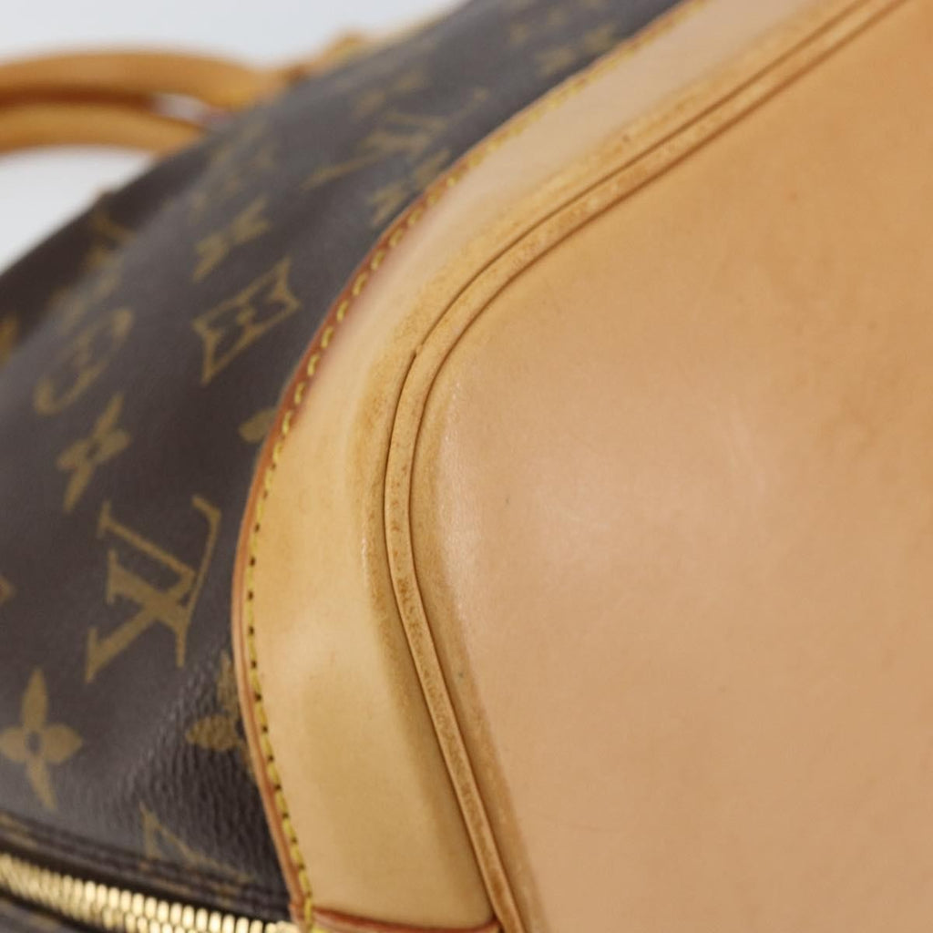 Louis Vuitton Alma Handbag Monogram Canvas Brown Canvas Handbag (Pre-Owned)