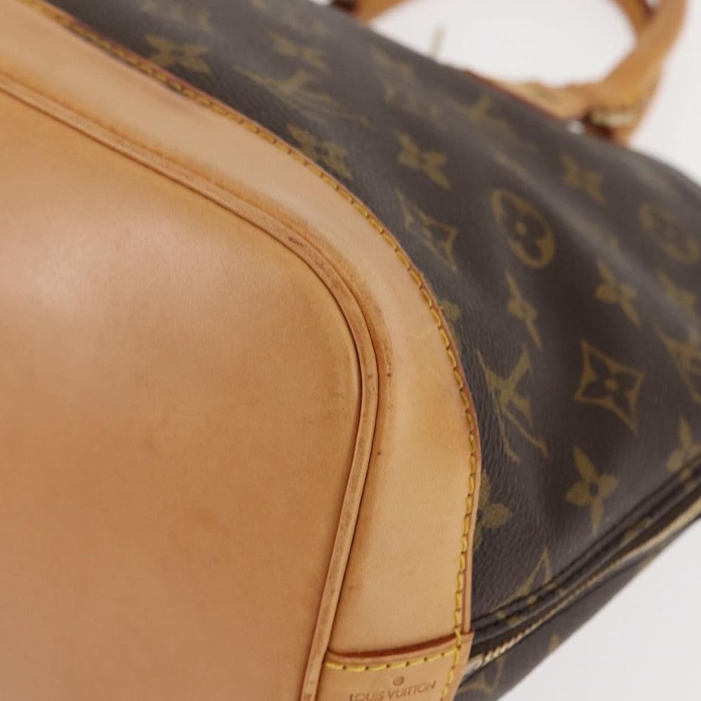 Louis Vuitton Alma Handbag Monogram Canvas Brown Canvas Handbag (Pre-Owned)