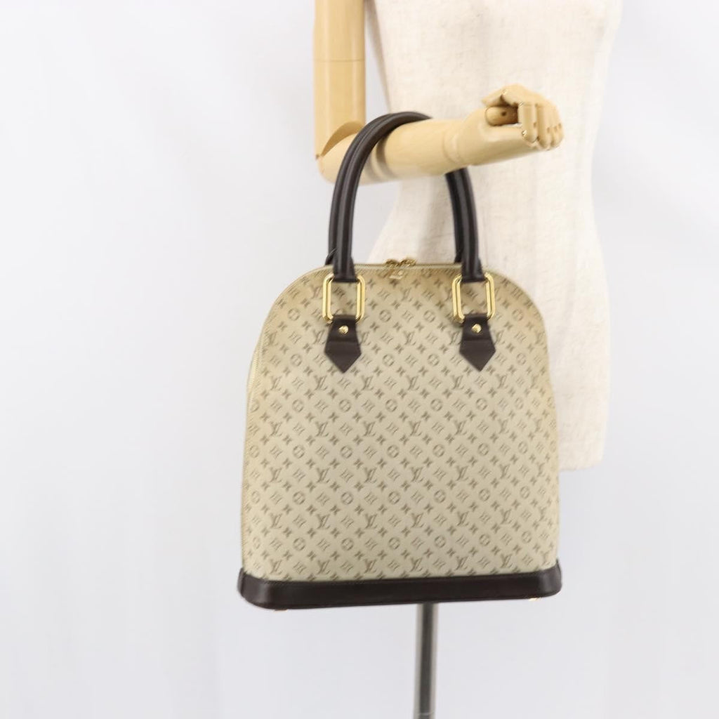 Louis Vuitton Alma Handbag Mini Lin Monogram Khaki Canvas Handbag (Pre-Owned)