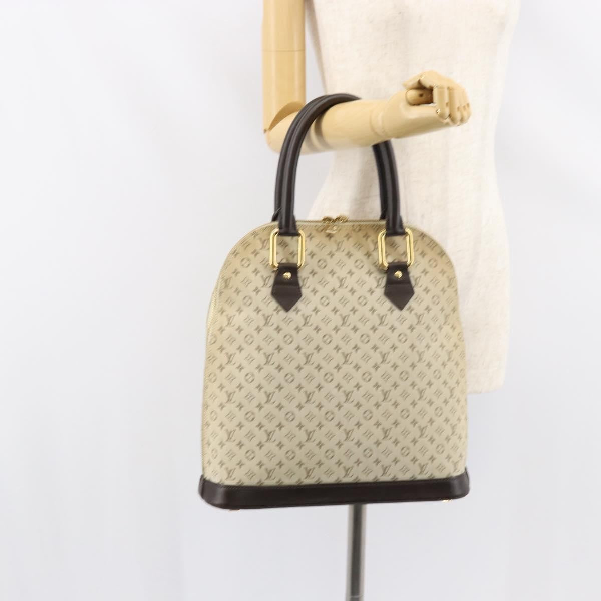 Louis Vuitton Alma Handbag Mini Lin Monogram Khaki Canvas Handbag (Pre-Owned)
