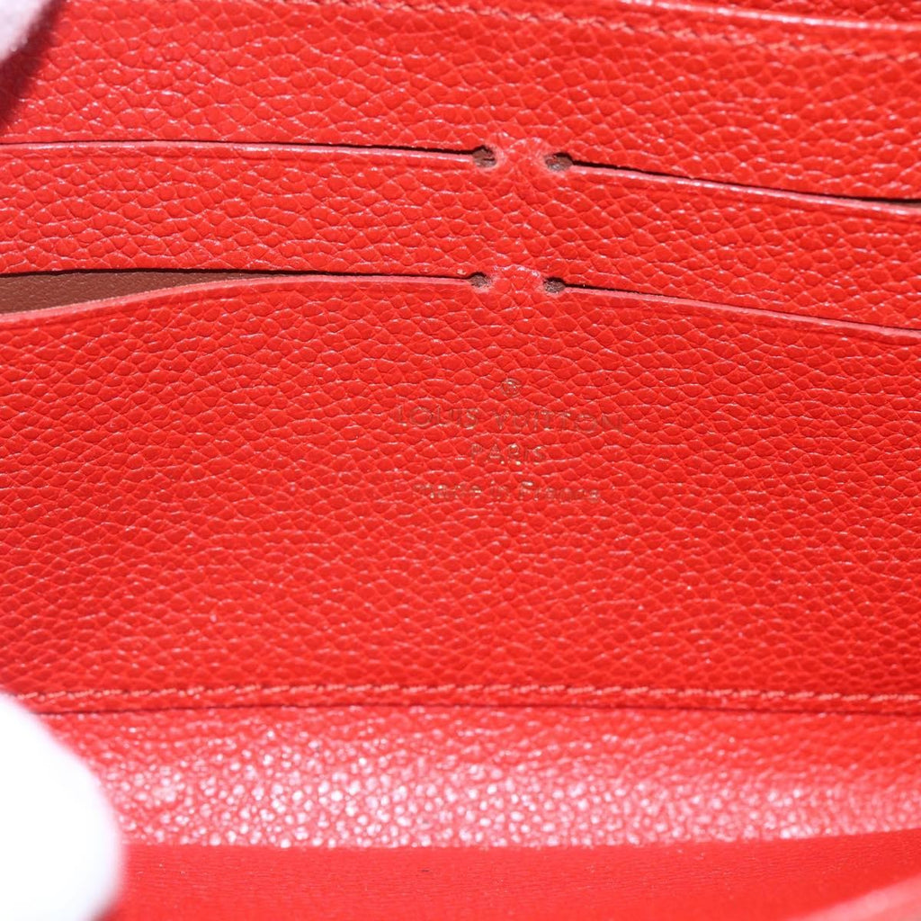 Louis Vuitton Portefeuille Zippy Monogramme Empreinte Monogramme Empreinte Red Leather Wallets Accessory (Pre-Owned)