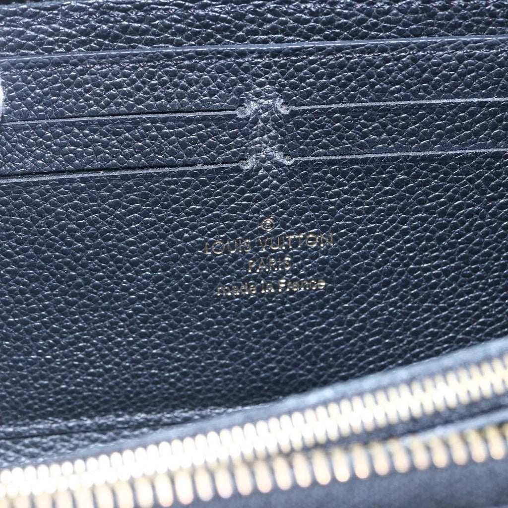 Louis Vuitton Portefeuille Zippy Monogramme Empreinte Monogramme Empreinte Black Leather Wallets Accessory (Pre-Owned)