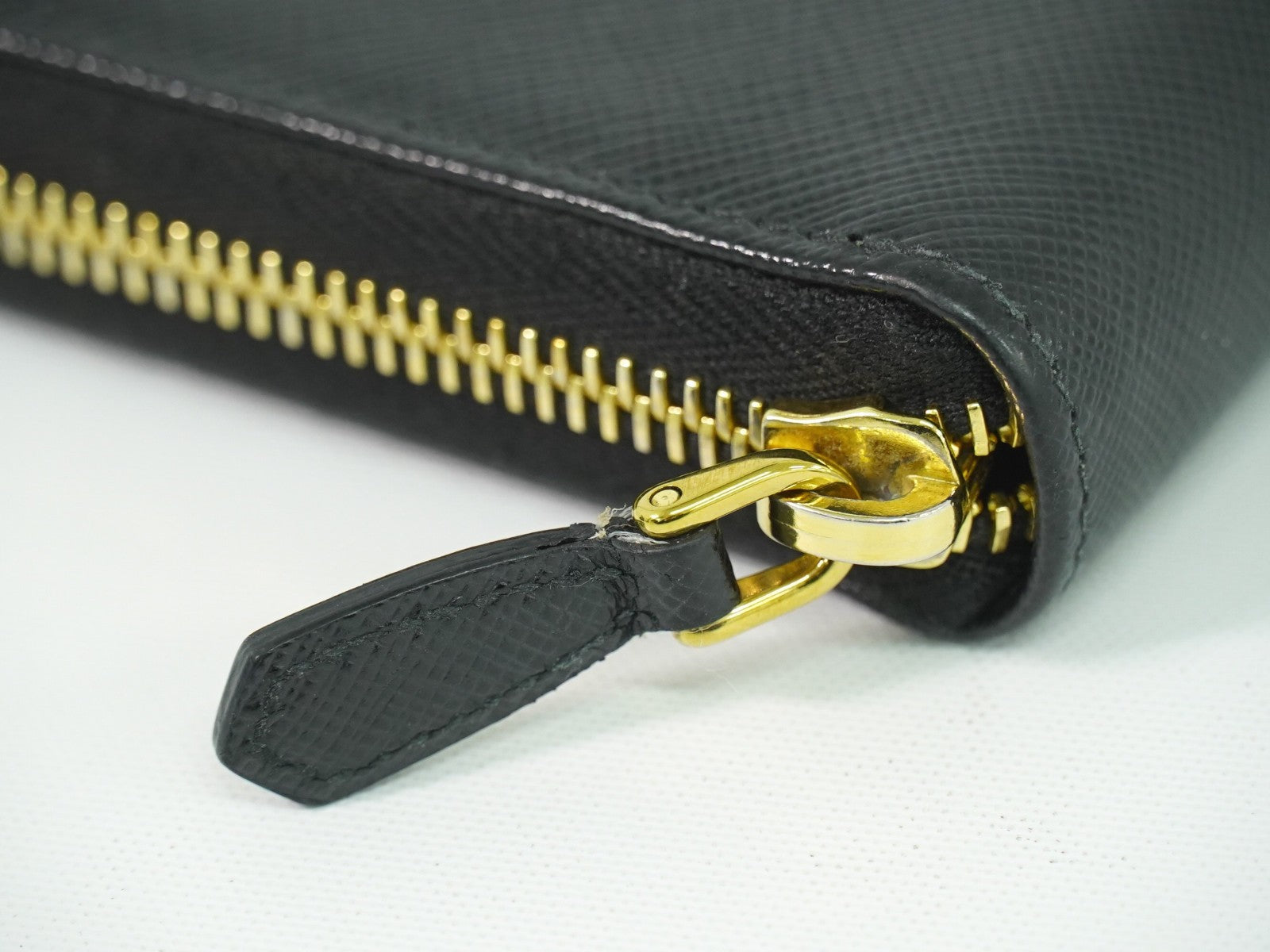 Prada Zip Around Tab Wallet Saffiano Leather Black Leather Wallets Accessory (Pre-Owned)