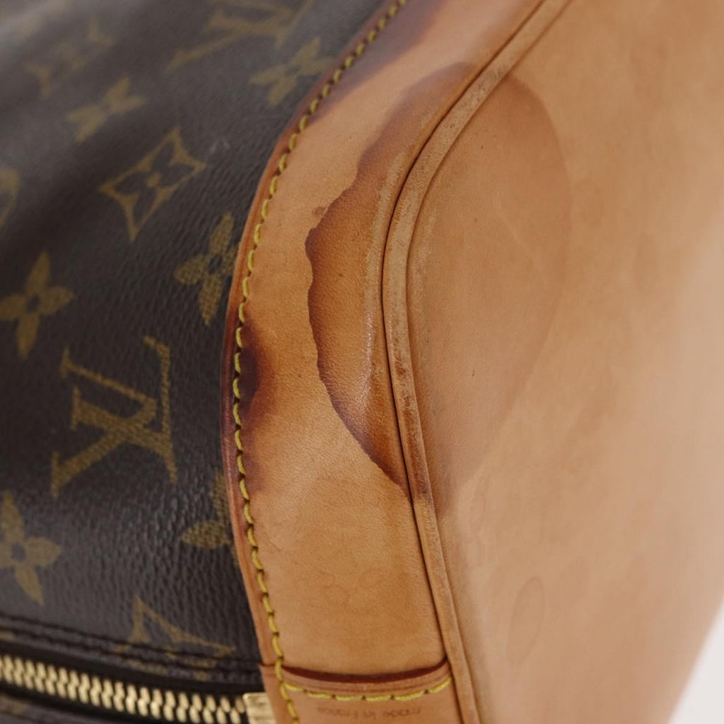 Louis Vuitton Alma Handbag Monogram Canvas Brown Canvas Handbag (Pre-Owned)