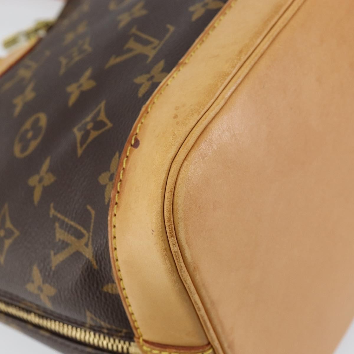 Louis Vuitton Alma Handbag Monogram Canvas Brown Canvas Handbag (Pre-Owned)