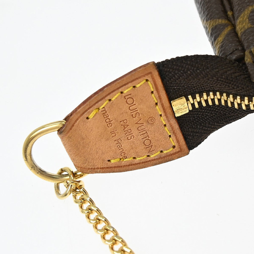 Louis Vuitton Mini Pochette Accessoires Canvas Brown Canvas Clutche & Pouche Bag (Pre-Owned)