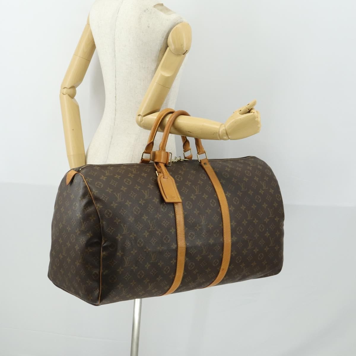 Louis Vuitton Keepall Bag Monogram Canvas Brown Canvas Travel Bag Bag (Pre-Owned)