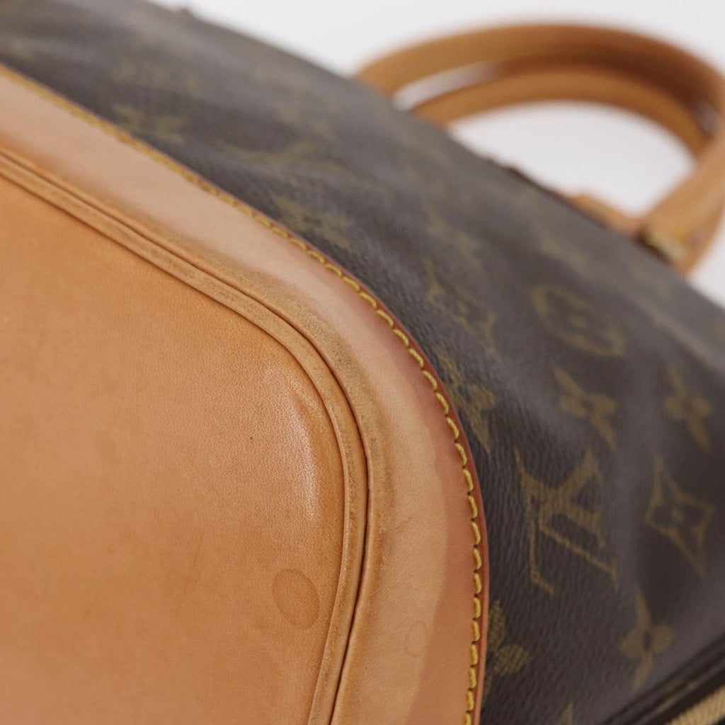 Louis Vuitton Alma Handbag Monogram Canvas Brown Canvas Handbag (Pre-Owned)