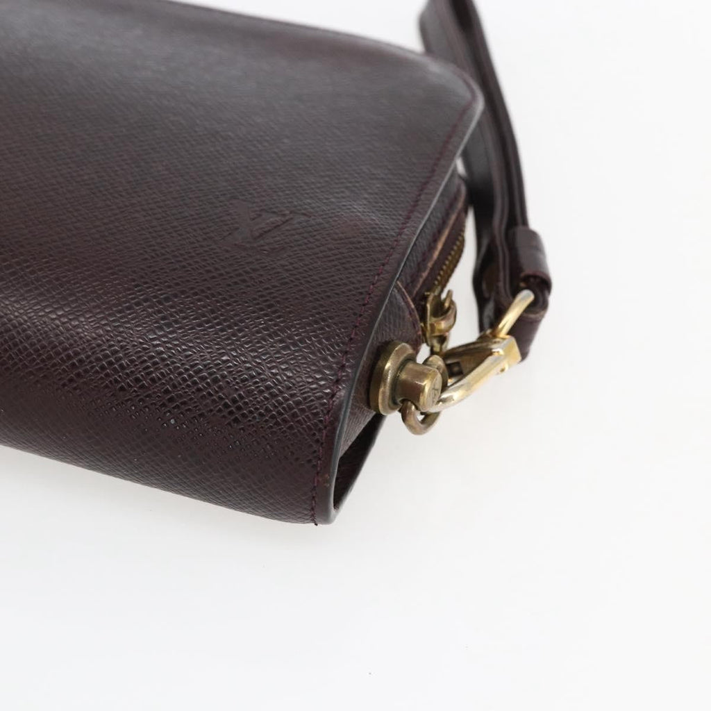 Louis Vuitton Pochette Baikal Clutch Taiga Leather Burgundy Leather Clutche & Pouche Bag (Pre-Owned)