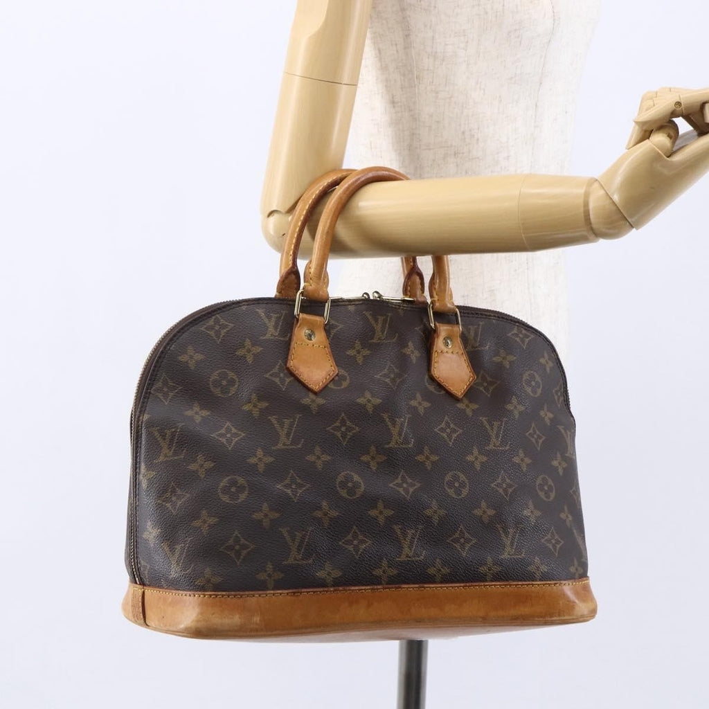 Louis Vuitton Vintage Alma Handbag Monogram Canvas Brown Canvas Handbag (Pre-Owned)