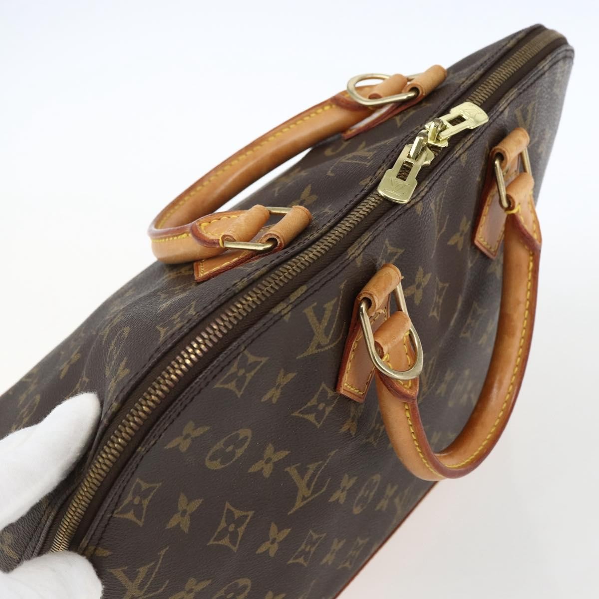 Louis Vuitton Alma Handbag Monogram Canvas Brown Canvas Handbag (Pre-Owned)