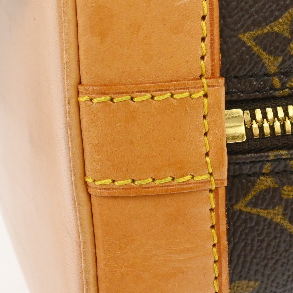 Louis Vuitton Alma Handbag Monogram Canvas Brown Canvas Handbag (Pre-Owned)