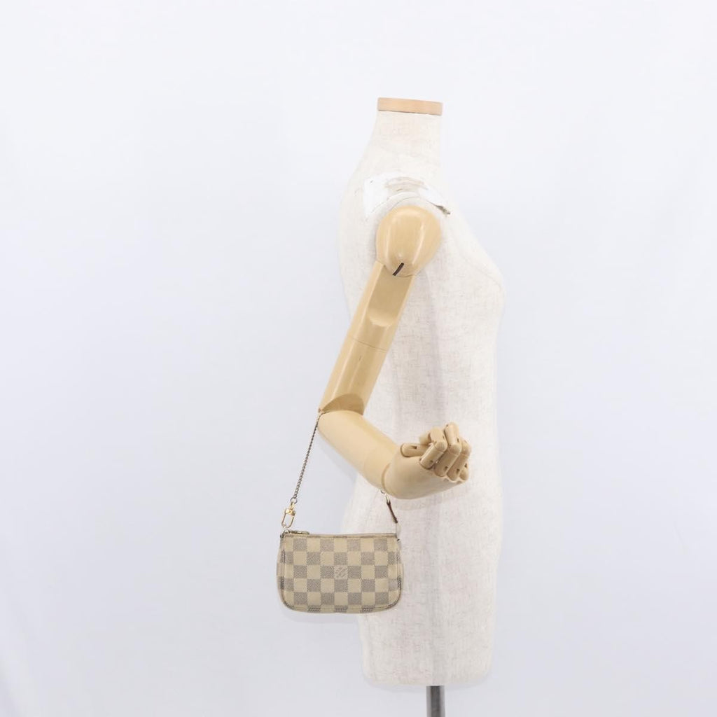 Louis Vuitton Mini Pochette Accessoires Damier Canvas White Canvas Clutche & Pouche Bag (Pre-Owned)