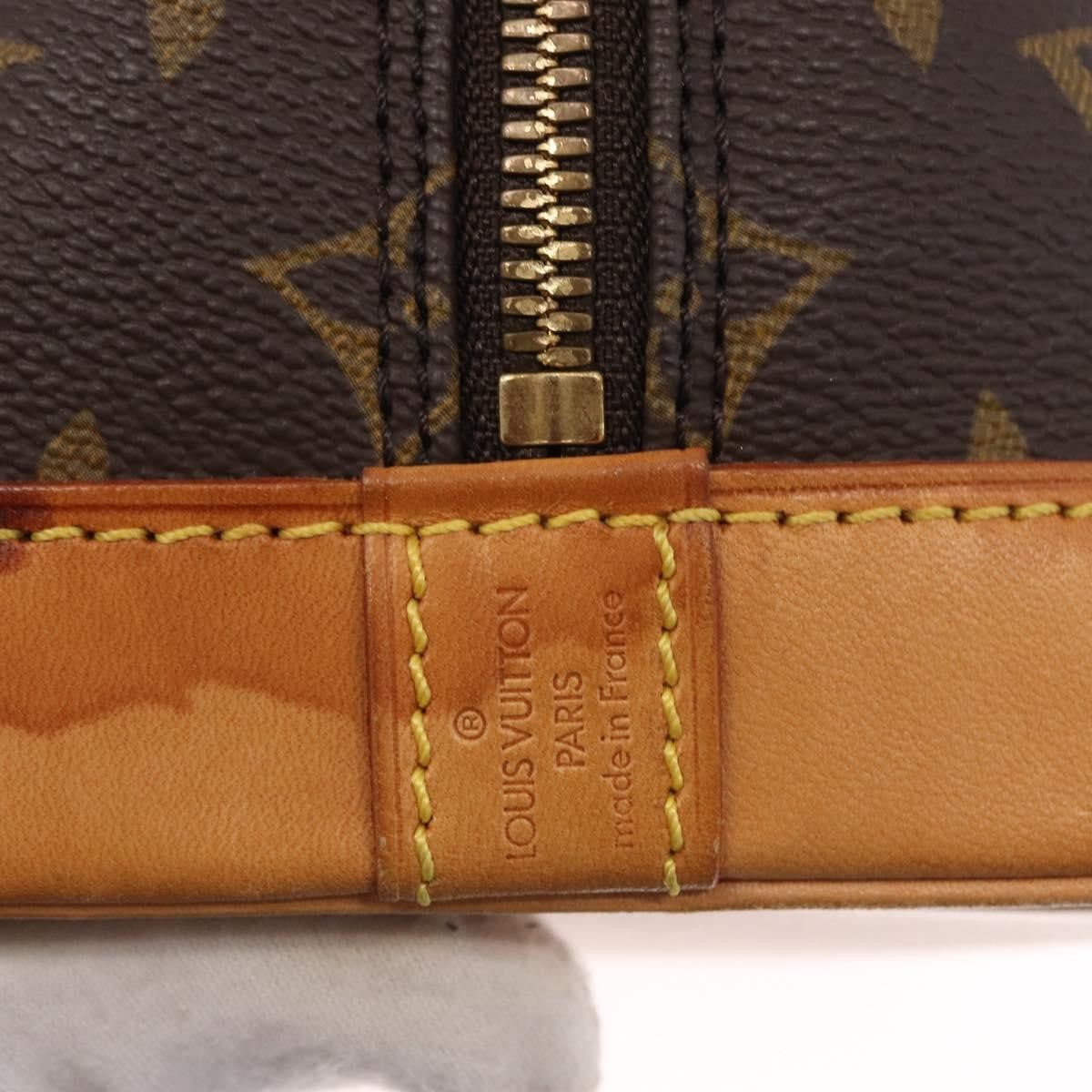 Louis Vuitton Alma Handbag Monogram Canvas Brown Canvas Handbag (Pre-Owned)