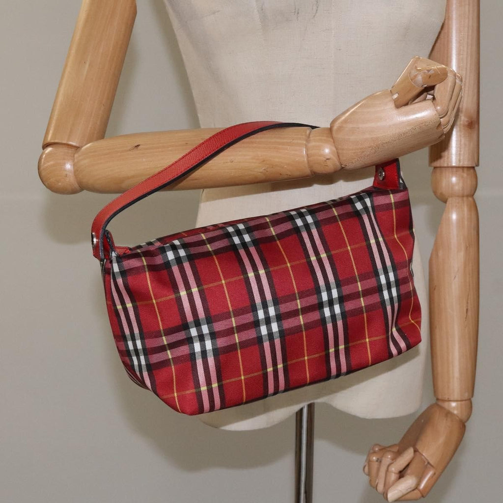 Burberry Nova Check Handbag Leather And Nylon Red Nylon Handbag (Pre-Owned)