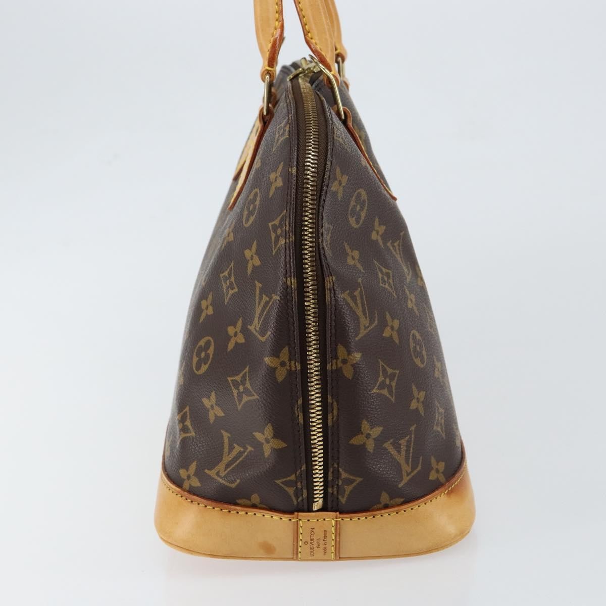 Louis Vuitton Alma Handbag Monogram Canvas Brown Canvas Handbag (Pre-Owned)