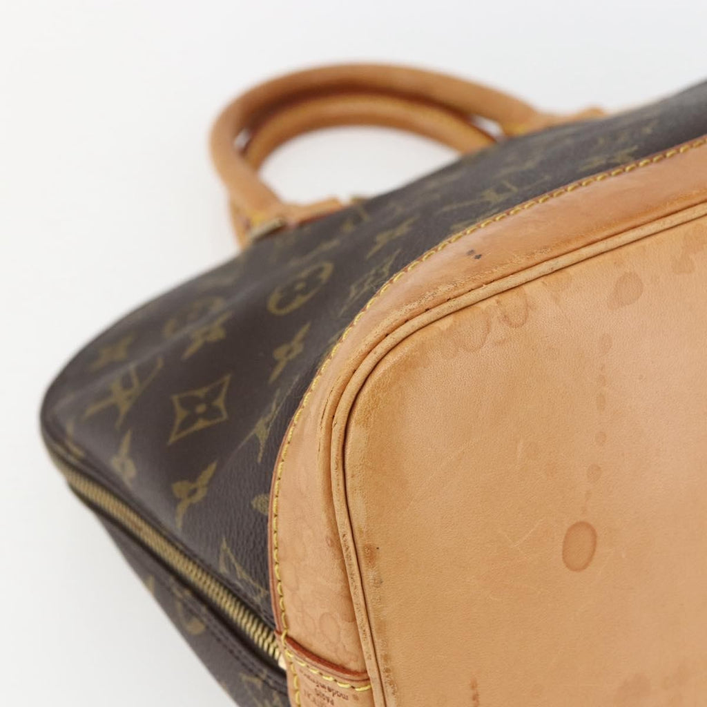 Louis Vuitton Alma Handbag Monogram Canvas Brown Canvas Handbag (Pre-Owned)