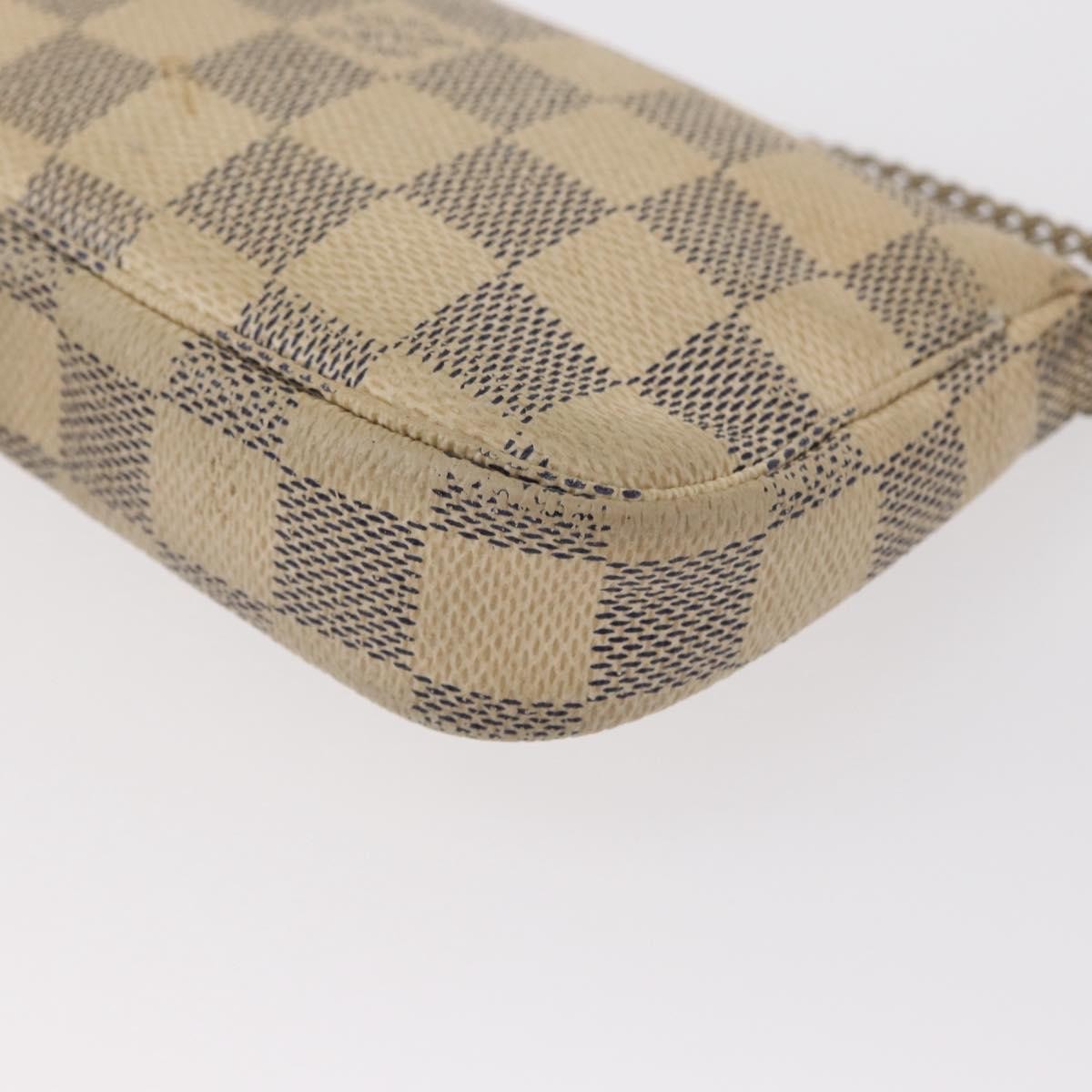 Louis Vuitton Mini Pochette Accessoires Damier Canvas White Canvas Clutche & Pouche Bag (Pre-Owned)