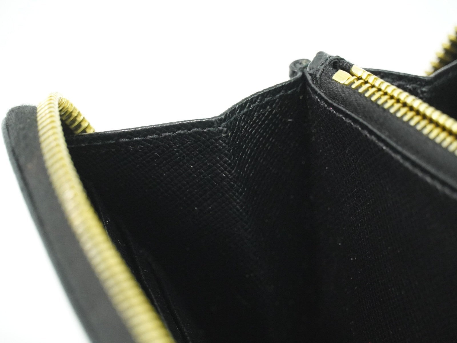 Prada Zip Around Tab Wallet Saffiano Leather Black Leather Wallets Accessory (Pre-Owned)