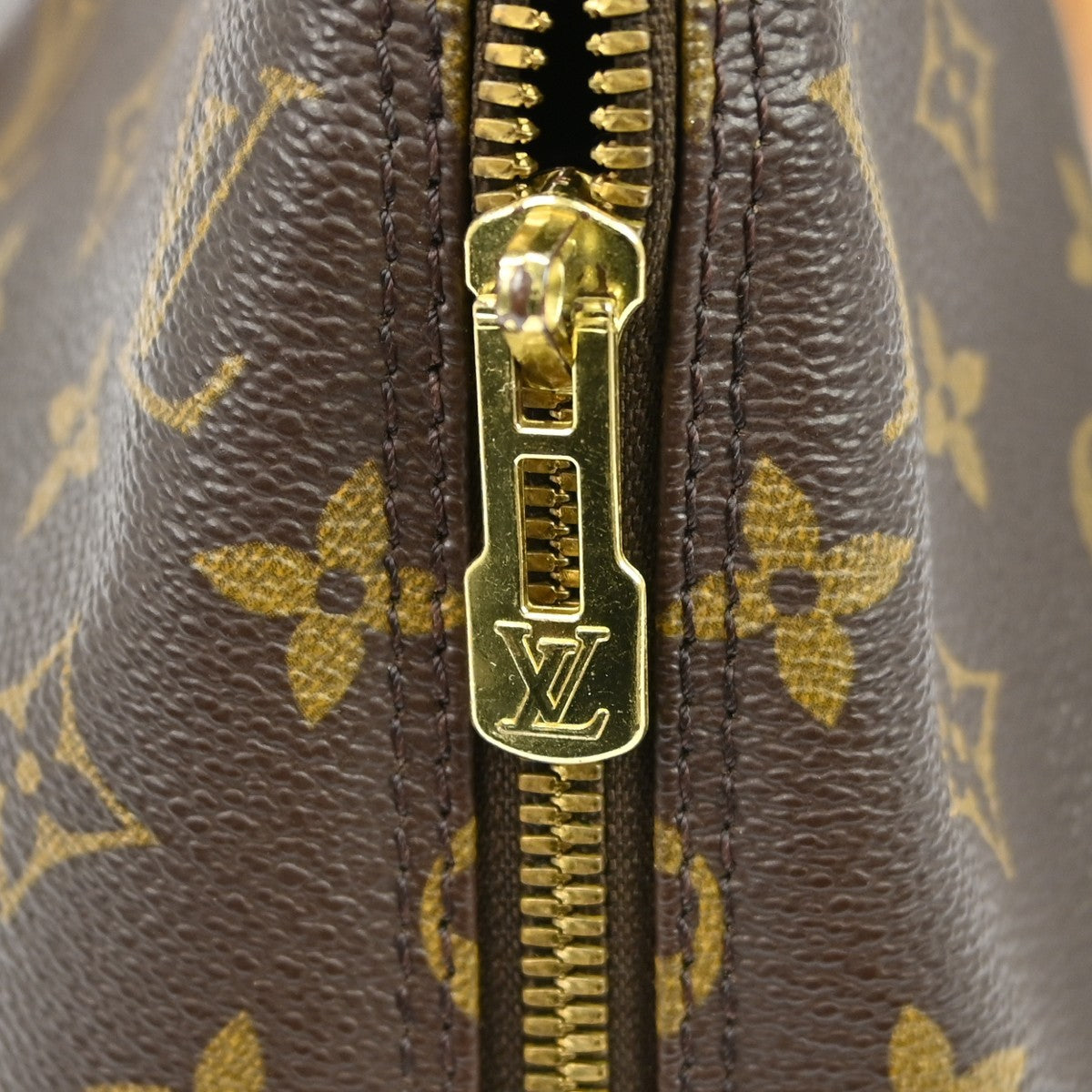 Louis Vuitton Alma Handbag Monogram Canvas Brown Canvas Handbag (Pre-Owned)
