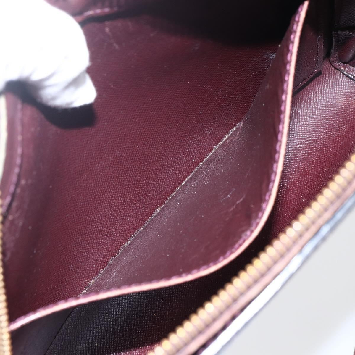 Louis Vuitton Pochette Baikal Clutch Taiga Leather Burgundy Leather Clutche & Pouche Bag (Pre-Owned)