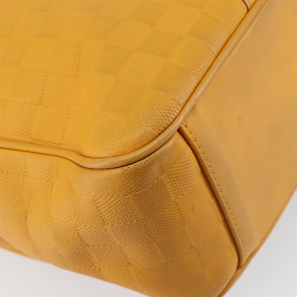 Louis Vuitton Tadao Handbag Damier Infini Leather Yellow Leather Handbag (Pre-Owned)