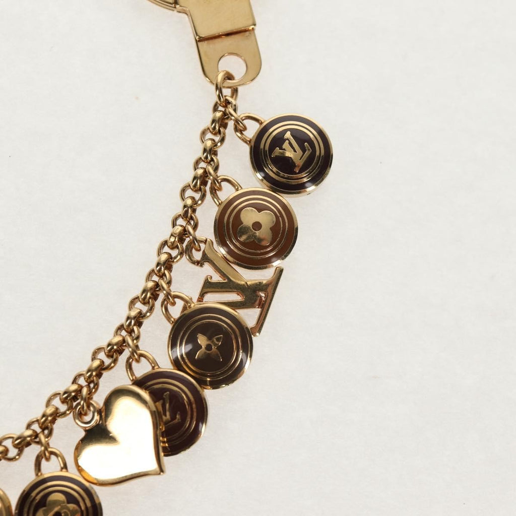 Louis Vuitton Pastilles Bag Charm And Key Holder Metal And Enamel Gold Metal Charms And Keychains Accessory (Pre-Owned)