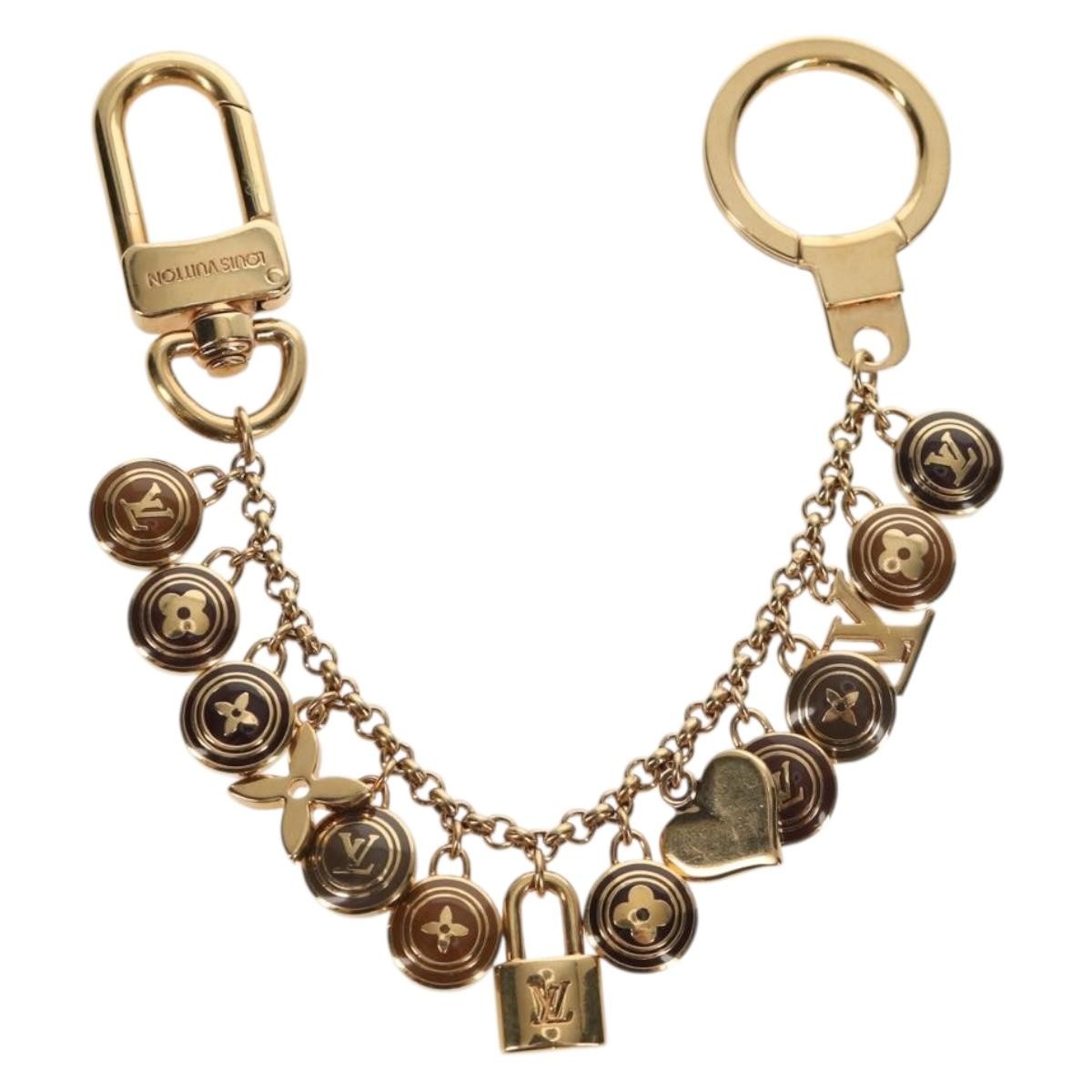 Louis Vuitton Pastilles Bag Charm And Key Holder Metal And Enamel Gold Metal Charms And Keychains Accessory (Pre-Owned)