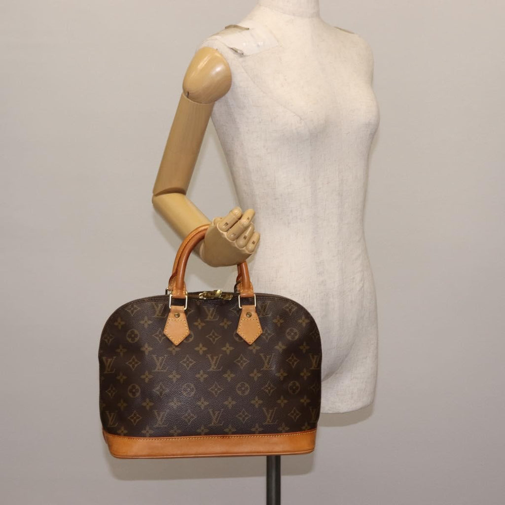 Louis Vuitton Alma Handbag Monogram Canvas Brown Canvas Handbag (Pre-Owned)