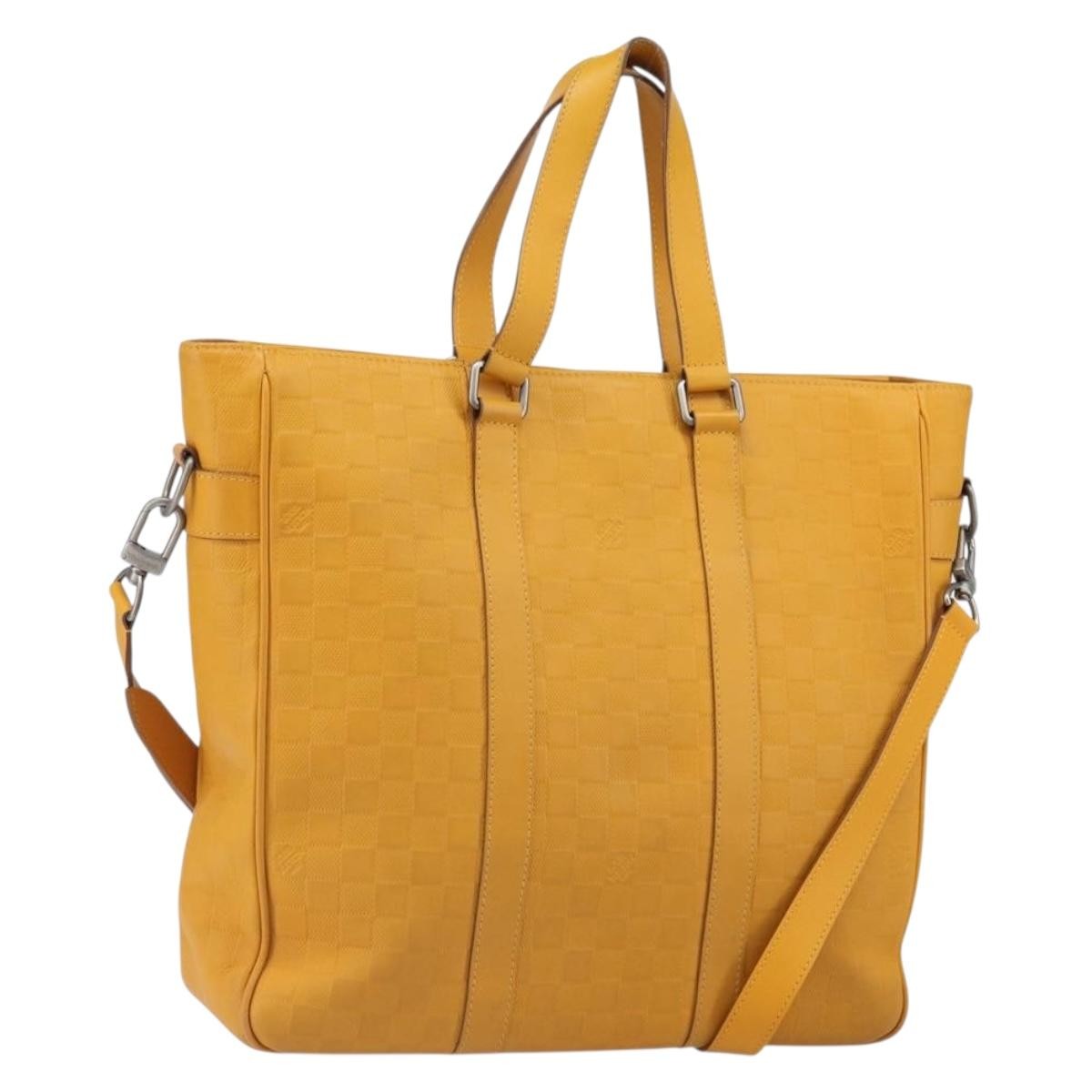 Louis Vuitton Tadao Handbag Damier Infini Leather Yellow Leather Handbag (Pre-Owned)