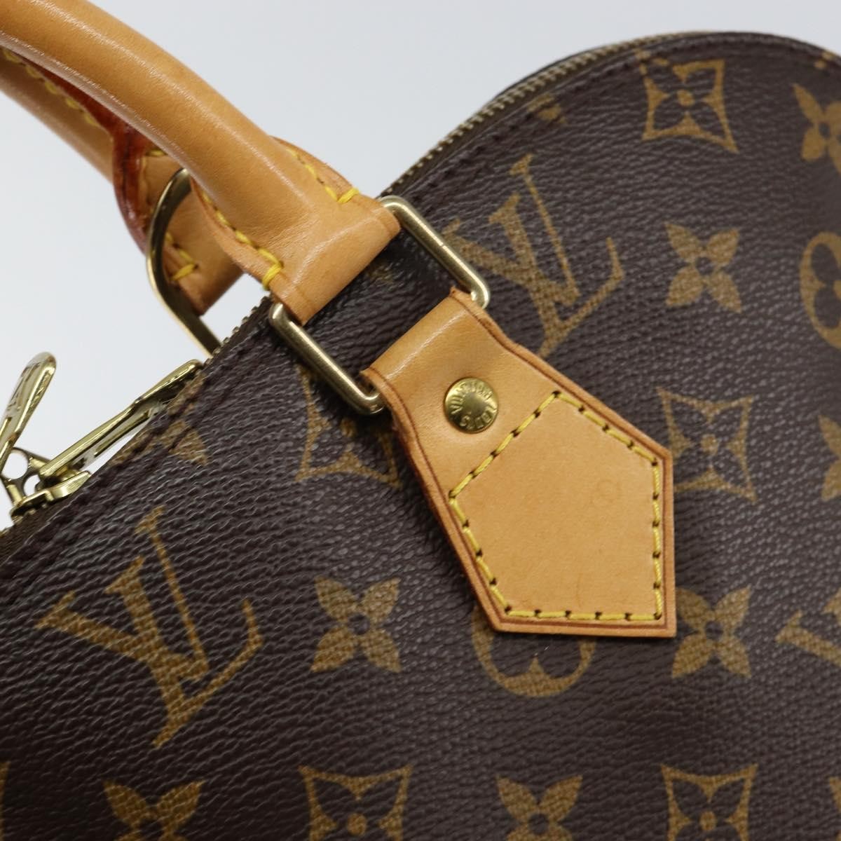 Louis Vuitton Alma Handbag Monogram Canvas Brown Canvas Handbag (Pre-Owned)