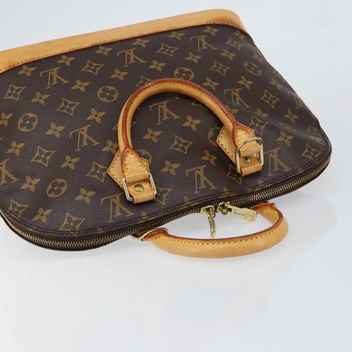 Louis Vuitton Alma Handbag Monogram Canvas Brown Canvas Handbag (Pre-Owned)