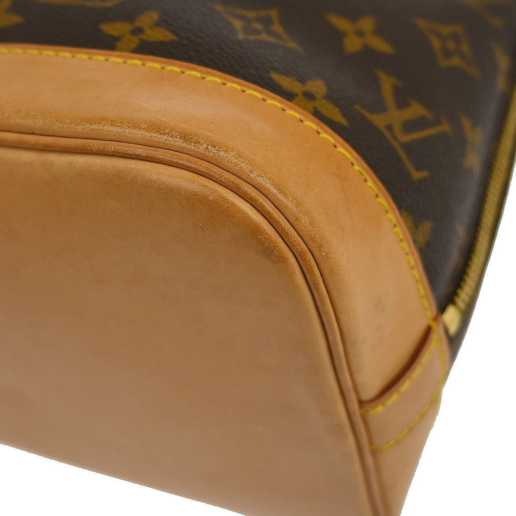 Louis Vuitton Alma Handbag Monogram Canvas Brown Canvas Handbag (Pre-Owned)