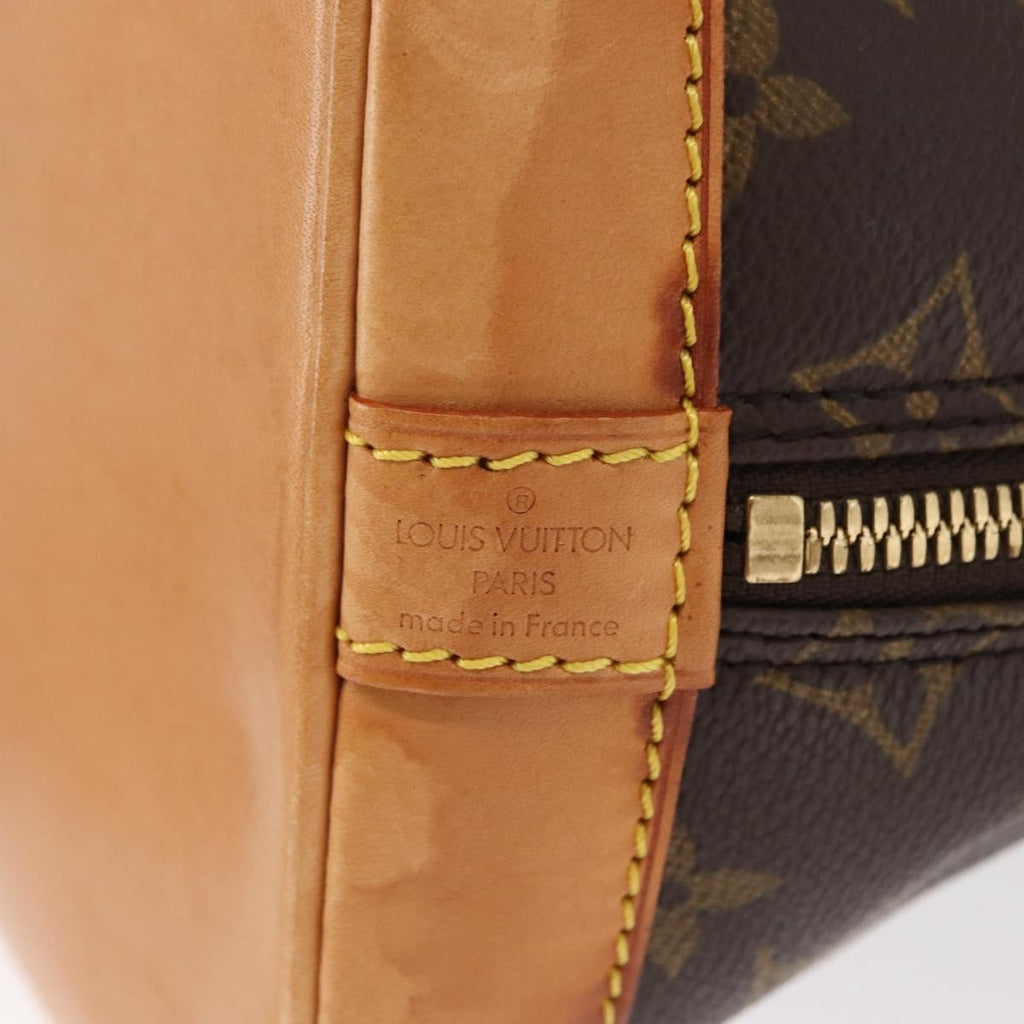 Louis Vuitton Alma Handbag Monogram Canvas Brown Canvas Handbag (Pre-Owned)