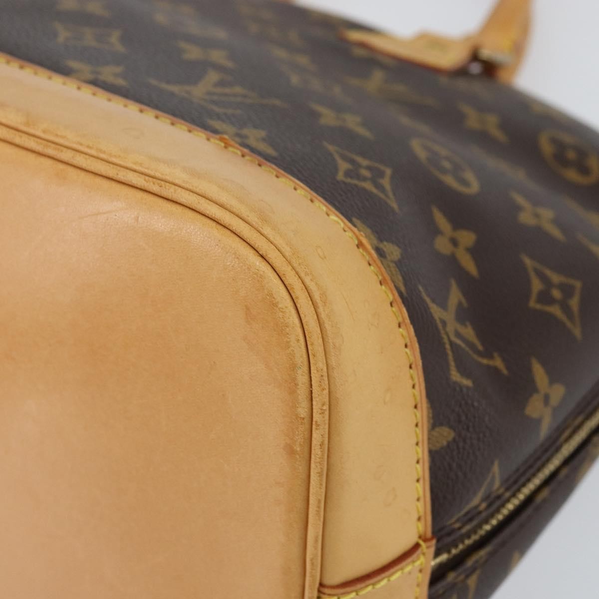 Louis Vuitton Alma Handbag Monogram Canvas Brown Canvas Handbag (Pre-Owned)