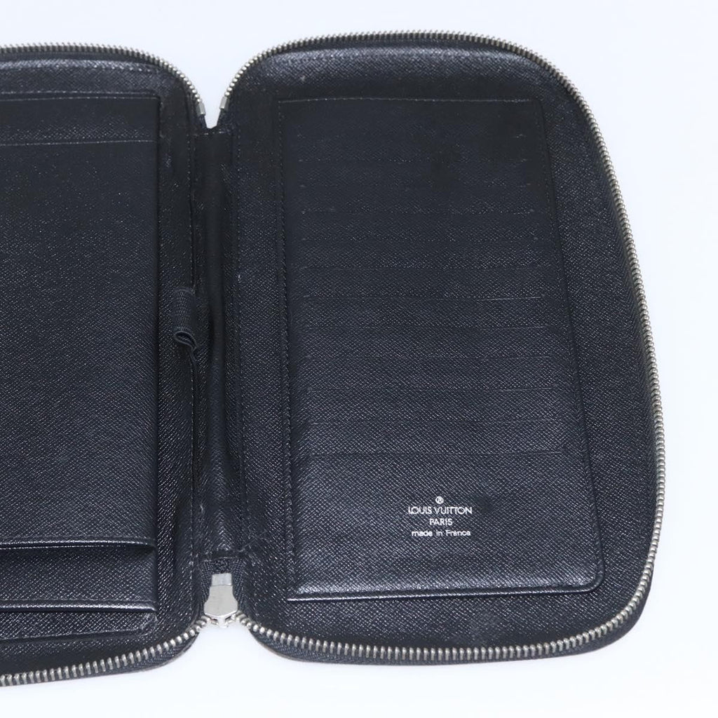 Louis Vuitton Atoll Organizer Wallet Taiga Leather Black Leather Clutche & Pouche Bag (Pre-Owned)