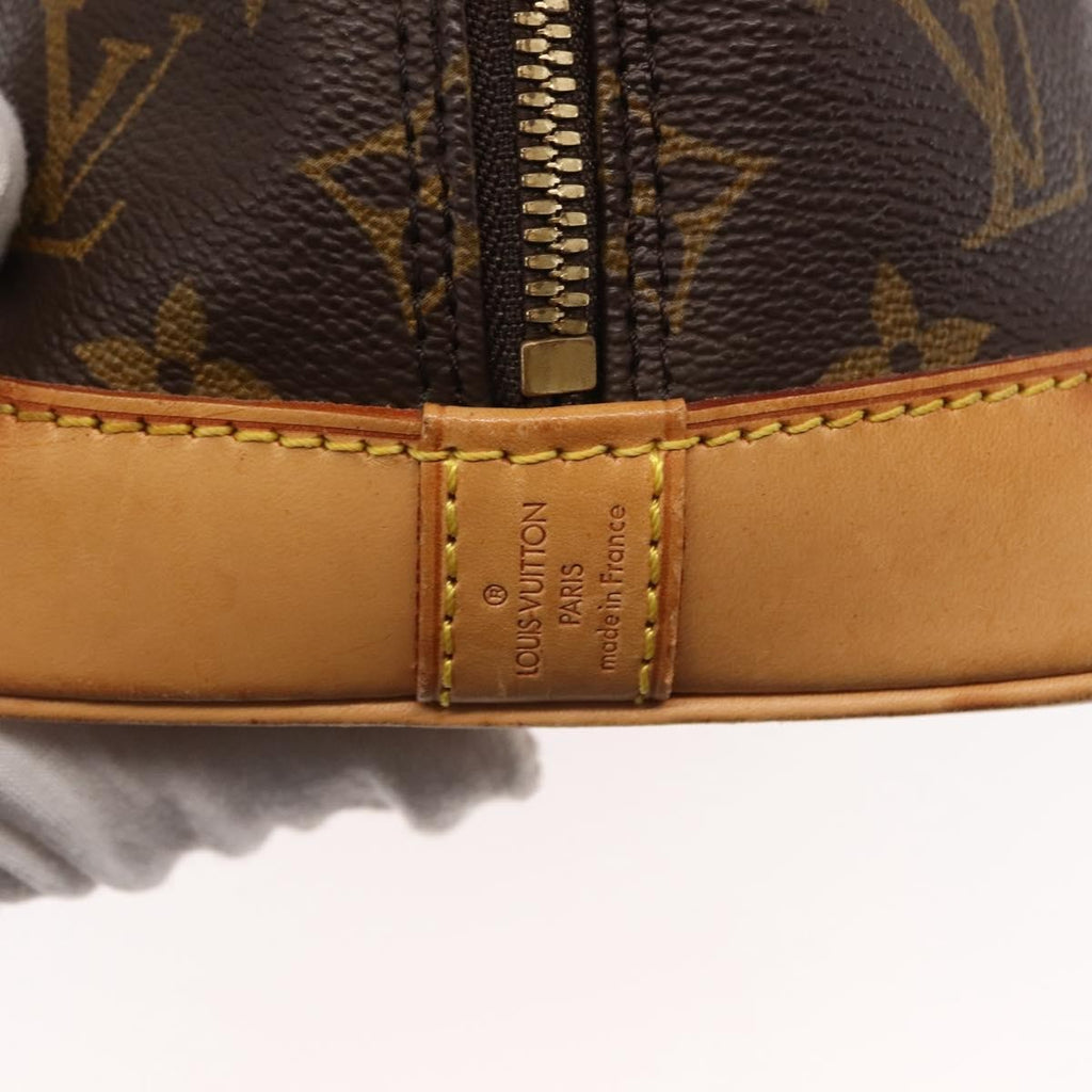 Louis Vuitton Alma Handbag Monogram Canvas Brown Canvas Handbag (Pre-Owned)