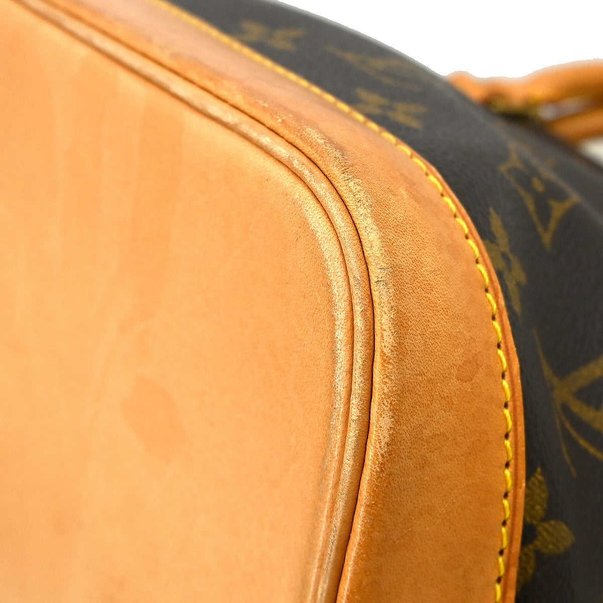 Louis Vuitton Alma Handbag Monogram Canvas Brown Canvas Handbag (Pre-Owned)
