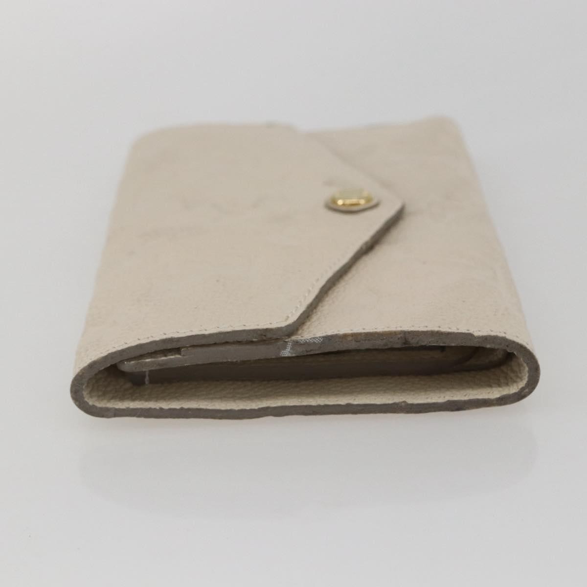 Louis Vuitton Zoe Wallet Monogram Empreinte Leather Beige Leather Wallets Accessory (Pre-Owned)
