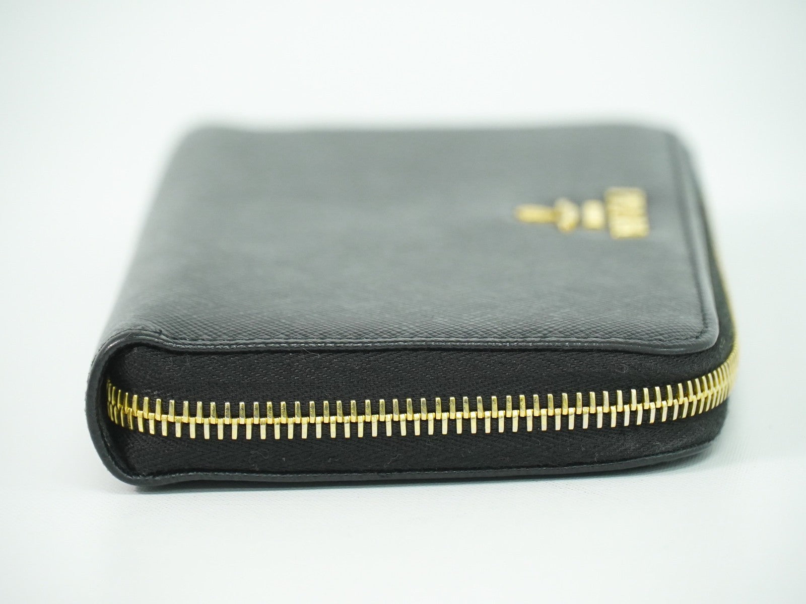 Prada Zip Around Tab Wallet Saffiano Leather Black Leather Wallets Accessory (Pre-Owned)