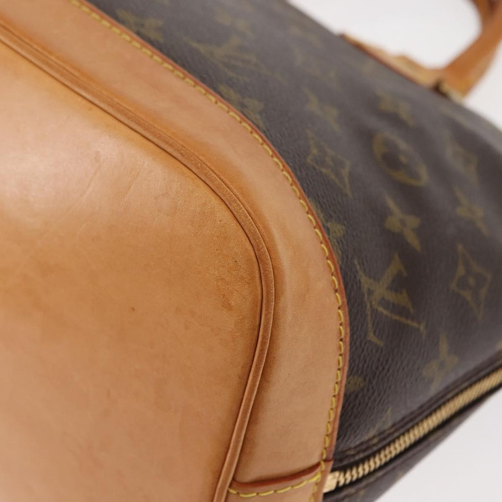 Louis Vuitton Alma Handbag Monogram Canvas Brown Canvas Handbag (Pre-Owned)