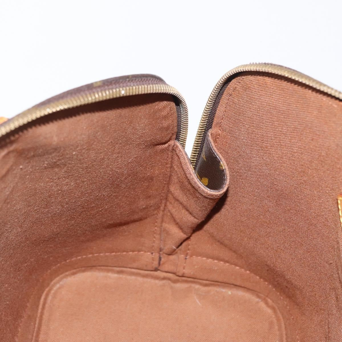 Louis Vuitton Alma Handbag Monogram Canvas Brown Canvas Handbag (Pre-Owned)