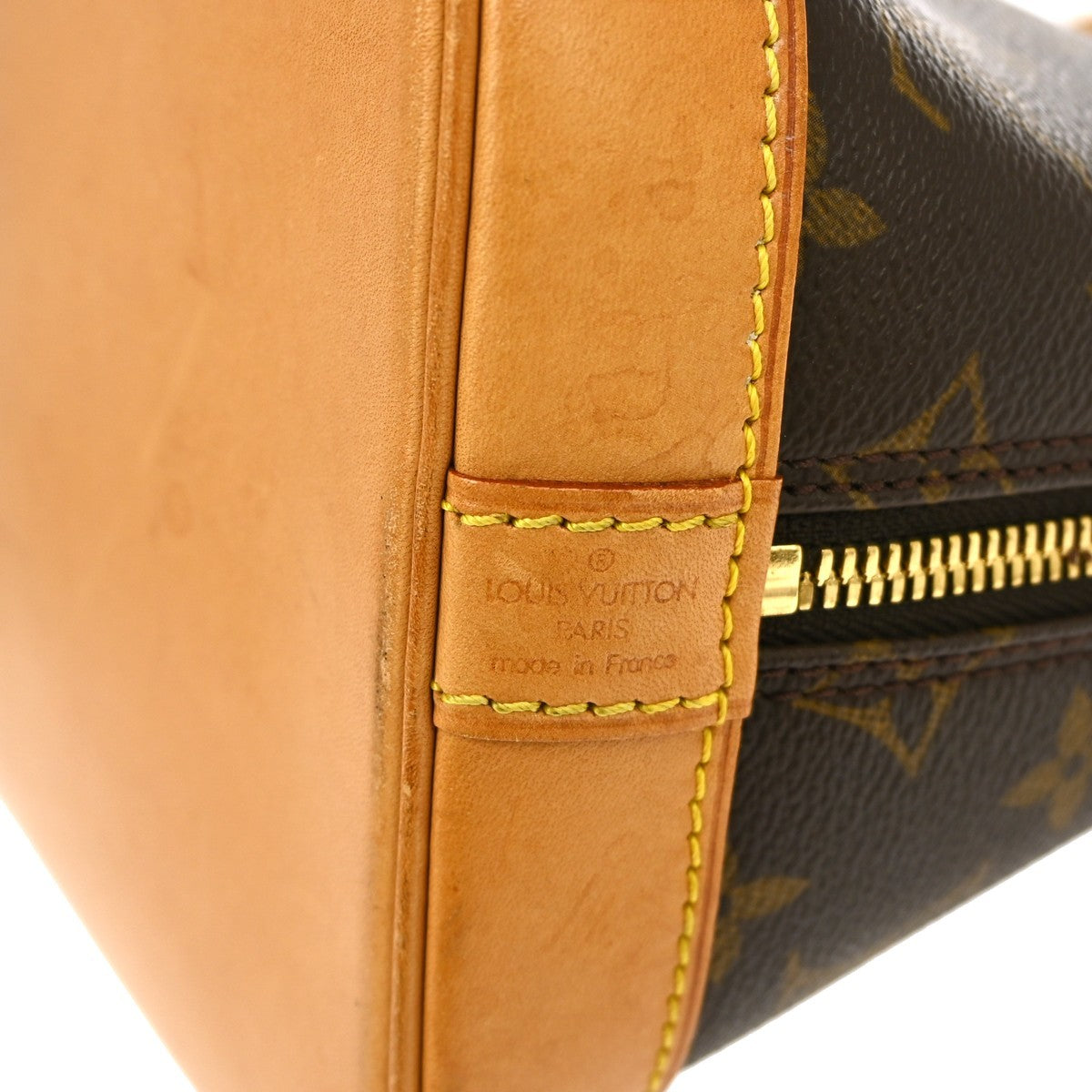Louis Vuitton Alma Handbag Monogram Canvas Brown Canvas Handbag (Pre-Owned)