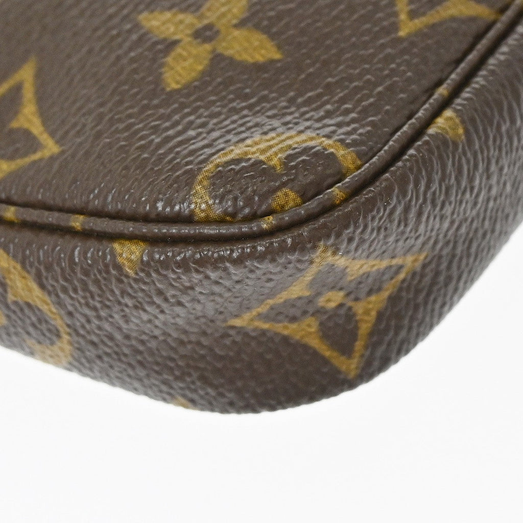 Louis Vuitton Mini Pochette Accessoires Canvas Brown Canvas Clutche & Pouche Bag (Pre-Owned)