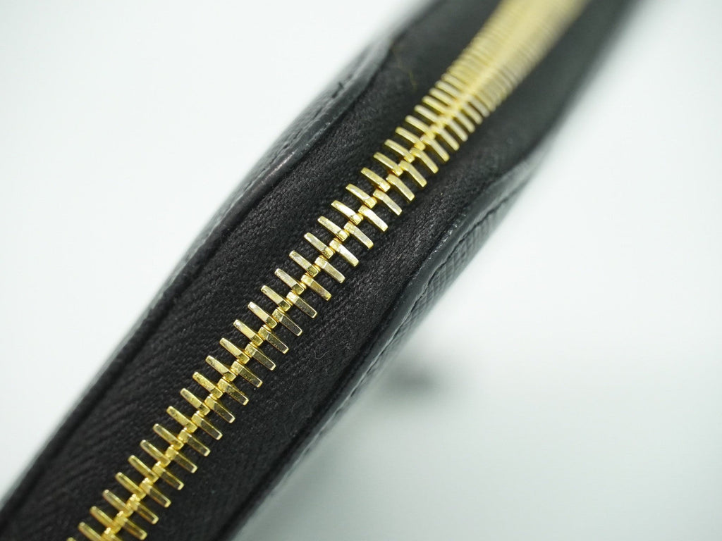 Prada Zip Around Tab Wallet Saffiano Leather Black Leather Wallets Accessory (Pre-Owned)