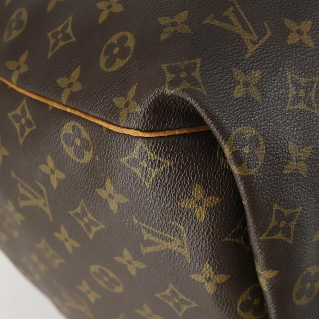 Louis Vuitton Keepall Bag Monogram Canvas Brown Canvas Travel Bag Bag (Pre-Owned)
